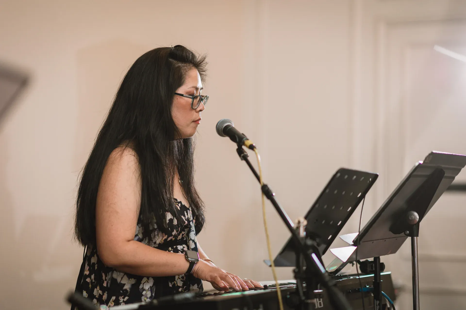 Anhthu at the keyboard during an event